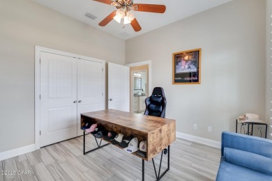 Nestled within the gated Dolphin Bay community, 906 Dolphin