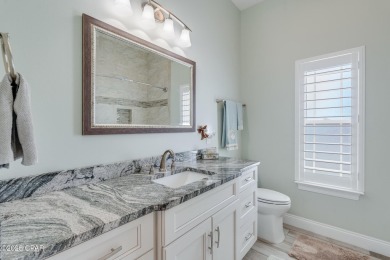 Nestled within the gated Dolphin Bay community, 906 Dolphin