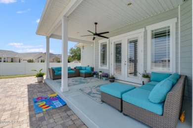 Nestled within the gated Dolphin Bay community, 906 Dolphin