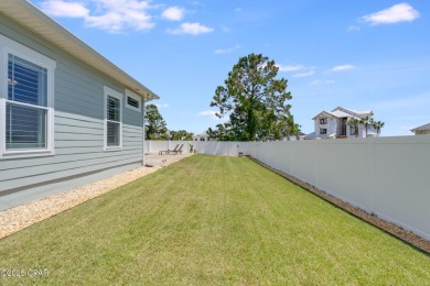 Nestled within the gated Dolphin Bay community, 906 Dolphin