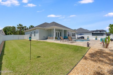 Nestled within the gated Dolphin Bay community, 906 Dolphin