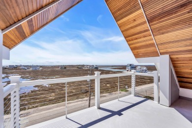 Welcome to your Beach House, a stunning example of contemporary