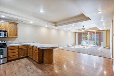 Experience riverfront living at its finest in this spacious