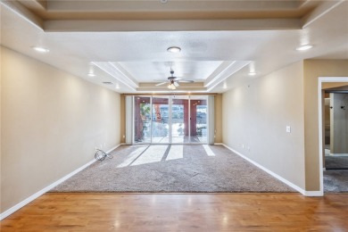 Experience riverfront living at its finest in this spacious