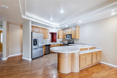 Experience riverfront living at its finest in this spacious