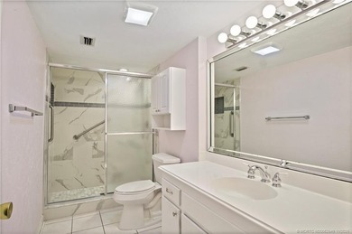 This light and bright second floor condo is in an elevator