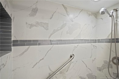 This light and bright second floor condo is in an elevator