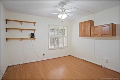 This light and bright second floor condo is in an elevator