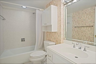 This light and bright second floor condo is in an elevator