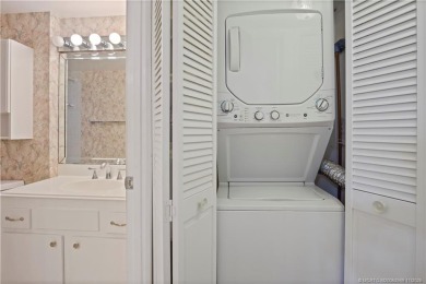 This light and bright second floor condo is in an elevator