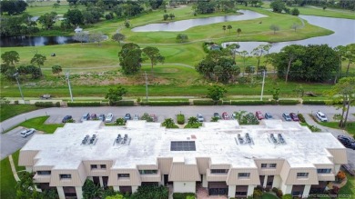 This light and bright second floor condo is in an elevator