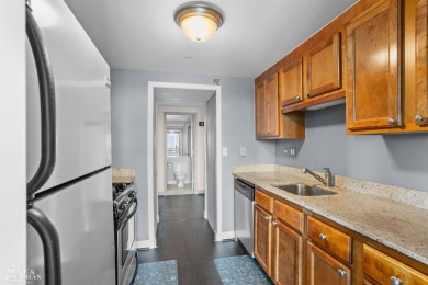 Wake up to sweeping views of the Detroit River and downtown