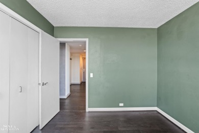 Wake up to sweeping views of the Detroit River and downtown