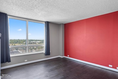 Wake up to sweeping views of the Detroit River and downtown