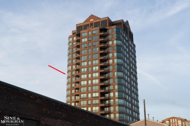 Wake up to sweeping views of the Detroit River and downtown