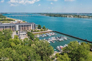 Wake up to sweeping views of the Detroit River and downtown