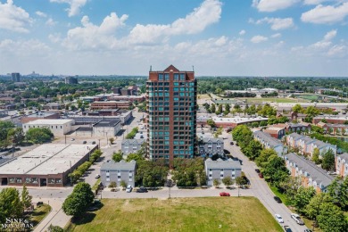Wake up to sweeping views of the Detroit River and downtown
