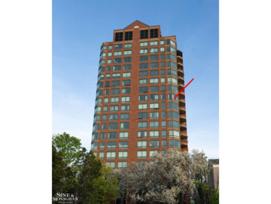 Wake up to sweeping views of the Detroit River and downtown