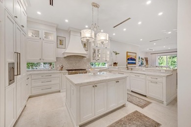 This stunning Mediterranean-style waterfront residence in the