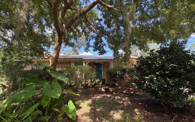 Beautifully refreshed brick home on 1 full acre just off US Hwy