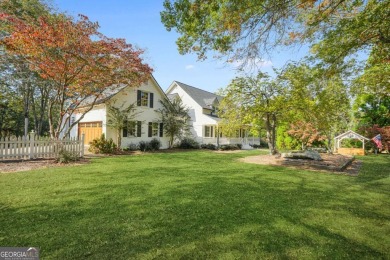 HIDDEN GEM! This quaint farmhouse on 8.64 acres has a small