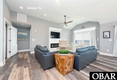 Experience the pinnacle of coastal living with 914 Sea Ridge, a