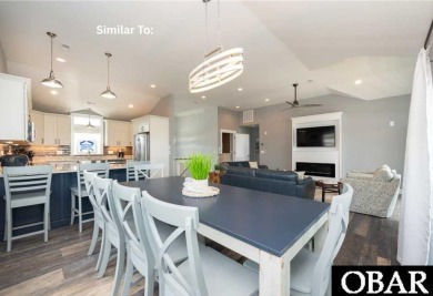 Experience the pinnacle of coastal living with 914 Sea Ridge, a