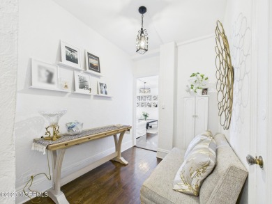 Live Coastal at The Santander This 2BR/1BA condo is where