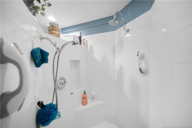 Attention car collectors!!! This unique lushly landscaped 3