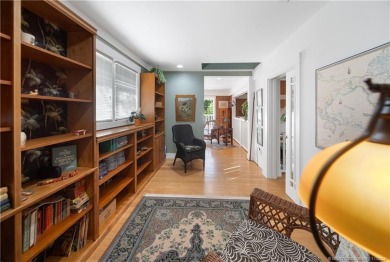 Attention car collectors!!! This unique lushly landscaped 3