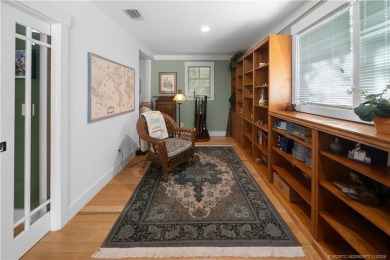 Attention car collectors!!! This unique lushly landscaped 3