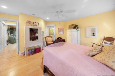 Attention car collectors!!! This unique lushly landscaped 3