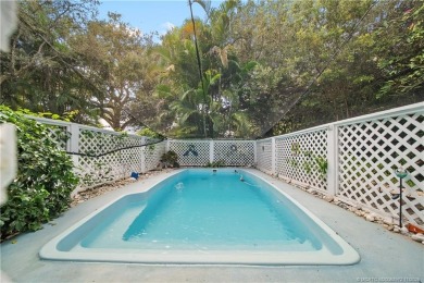 Attention car collectors!!! This unique lushly landscaped 3