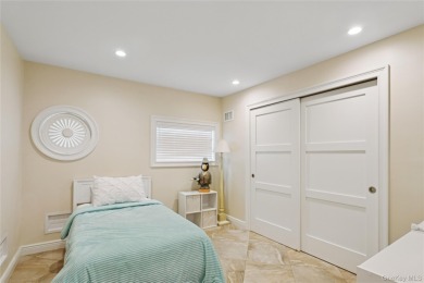 Contemporary Coastal Bayfront Retreat over-looking bird