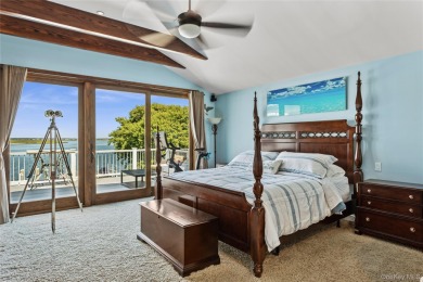 Contemporary Coastal Bayfront Retreat over-looking bird