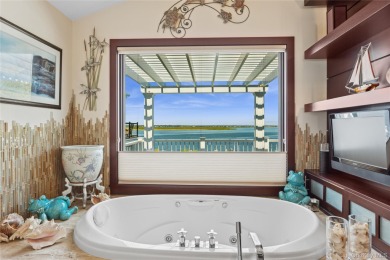 Contemporary Coastal Bayfront Retreat over-looking bird