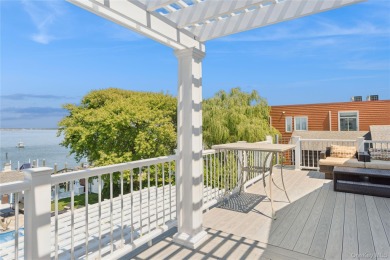 Contemporary Coastal Bayfront Retreat over-looking bird