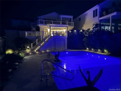 Contemporary Coastal Bayfront Retreat over-looking bird