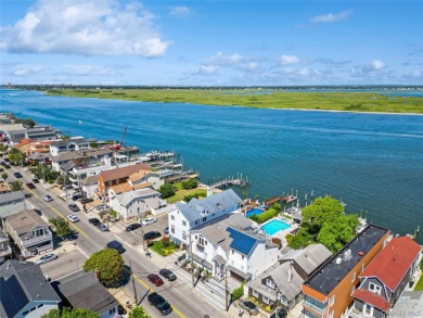 Contemporary Coastal Bayfront Retreat over-looking bird