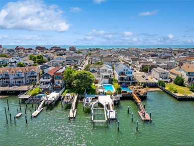 Contemporary Coastal Bayfront Retreat over-looking bird