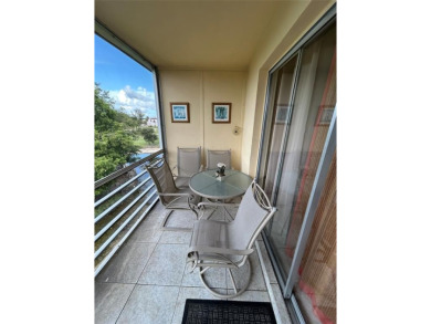 Lovely turnkey two bedroom two bath unit on third floor with