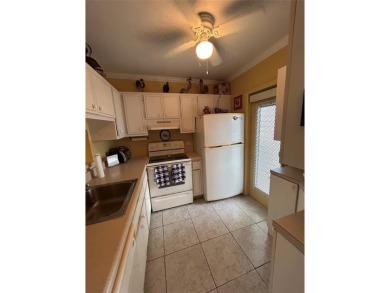 Lovely turnkey two bedroom two bath unit on third floor with