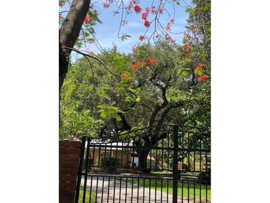 Legal income-producing fourplex on an oversized 21,780 SF lot in