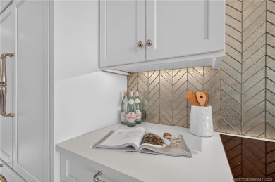 This spacious three-bedroom, three-bathroom first-floor Ocean