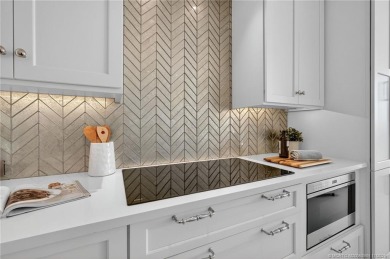 This spacious three-bedroom, three-bathroom first-floor Ocean