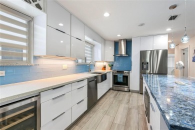 Luxurious contemporary home in Paradise. This 4 bedroom 4 1/2