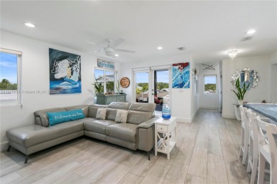 Luxurious contemporary home in Paradise. This 4 bedroom 4 1/2