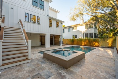 Just steps from the pristine sands of Isle of Palms, in an area