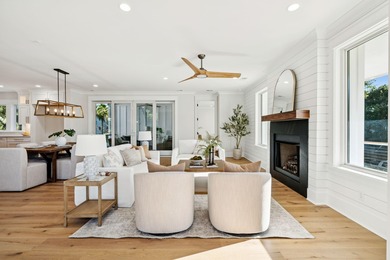 Just steps from the pristine sands of Isle of Palms, in an area