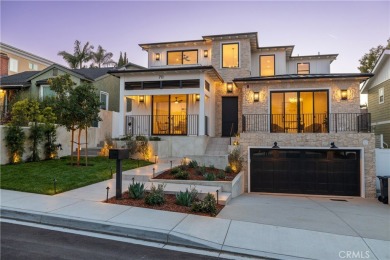 This stunning new construction home in Manhattan Beach offers 6